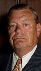 herec Warren Clarke